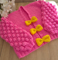 Hand-Knitted Pink Bobble-Sleeve Cardigan for Women | Chunky Popcorn Knit Jacket with Giant Yellow Bow Details | Cute Womens Sweater