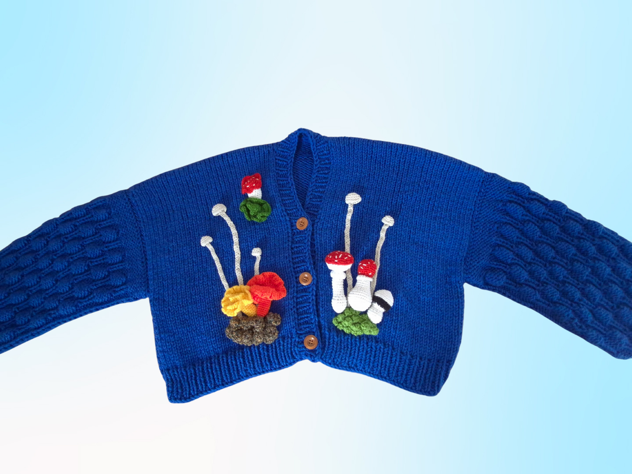 Chunky Blue Handknitted Cardigan with 3D Amigurumi Mushrooms & Moss – Oversized Soft Girl Knitwear, Cottagecore Crochet Pullover, Bobble Sleeves, Cozy Handmade Statement Sweater, Bright Vibrant Fashion Layering Piece