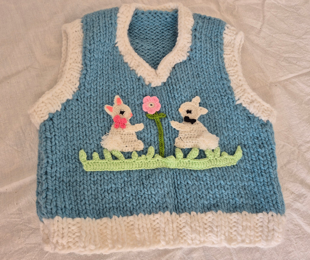 Handknitted Baby Blue & White Cropped Wool-Blend Vest with Bunny Appliqués – Cozy Handmade Knitwear, Soft Girl Girly Crochet Pullover, Bunnycore Croquette Vest, Oversized Layering Knit, Artisan Handmade Soft Knit