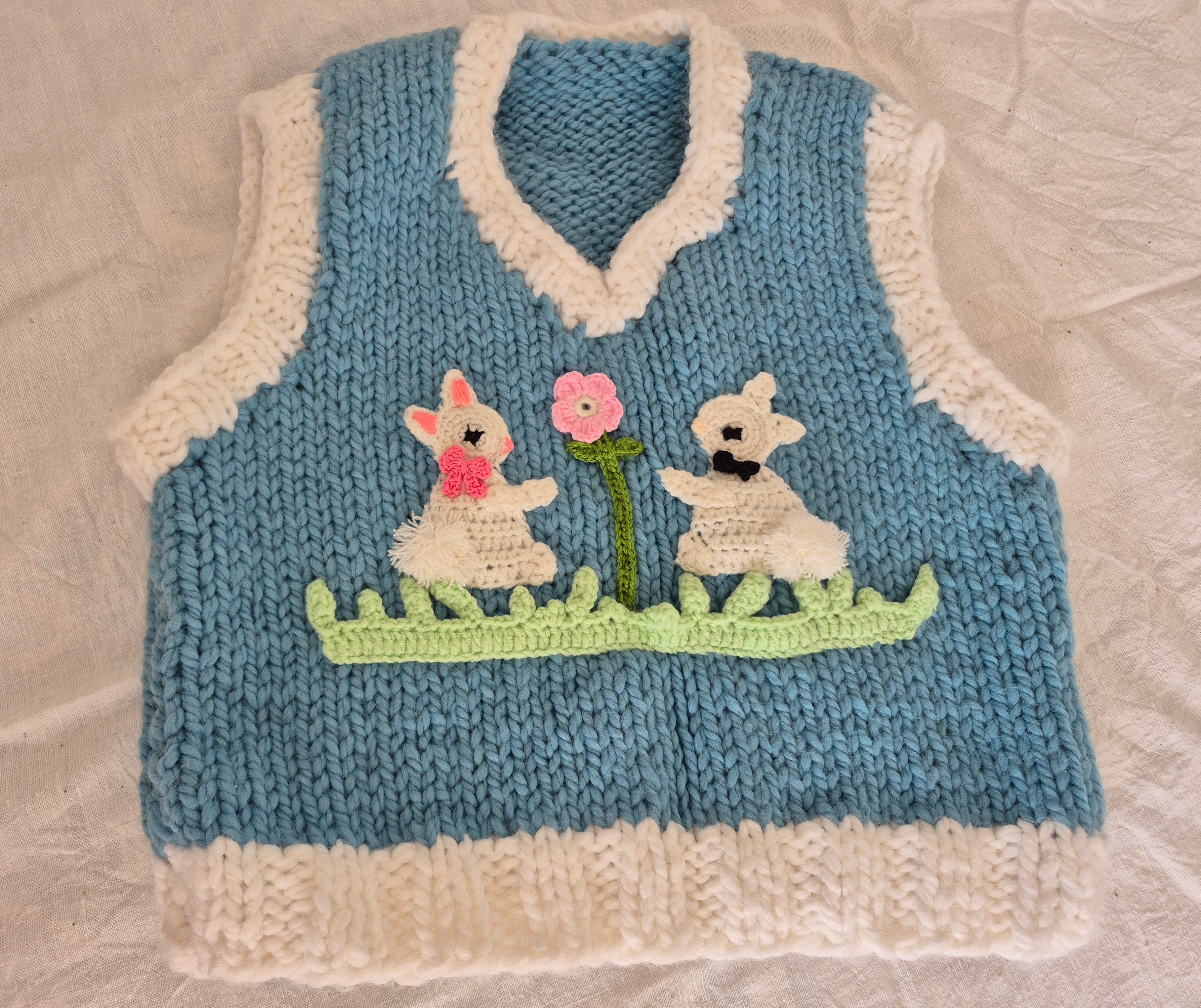 Handknitted Baby Blue & White Cropped Wool-Blend Vest with Bunny Appliqués – Cozy Handmade Knitwear, Soft Girl Girly Crochet Pullover, Bunnycore Croquette Vest, Oversized Layering Knit, Artisan Handmade Soft Knit